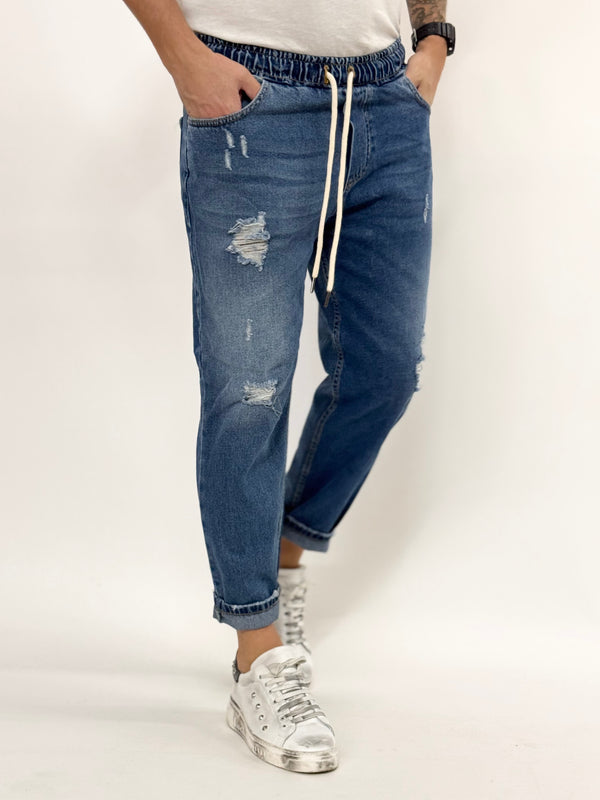 Jeans U.P con laccetto sabbiato rotture